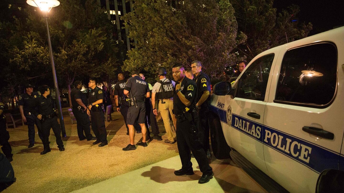 Police cars on Main Street in Dallas following the sniper shooting during a protest. Photograph: Getty