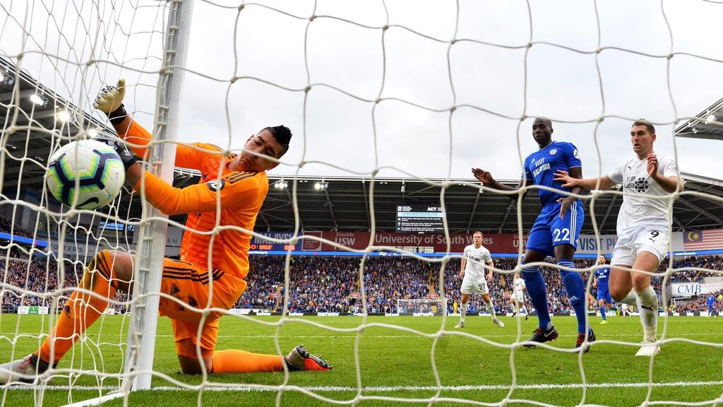 Sam Vokes of Burnley scores his side’s winning goal in the Premier League game against Cardiff City at Cardiff City Stadium. Photograph: Dan Mullan/Getty Images