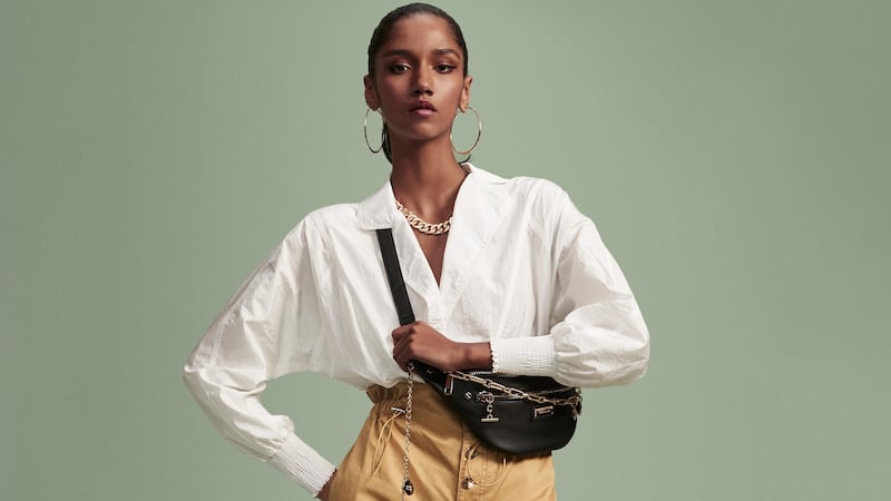 White shirt, €50, and high-waisted cargo pants, €45, River Island.