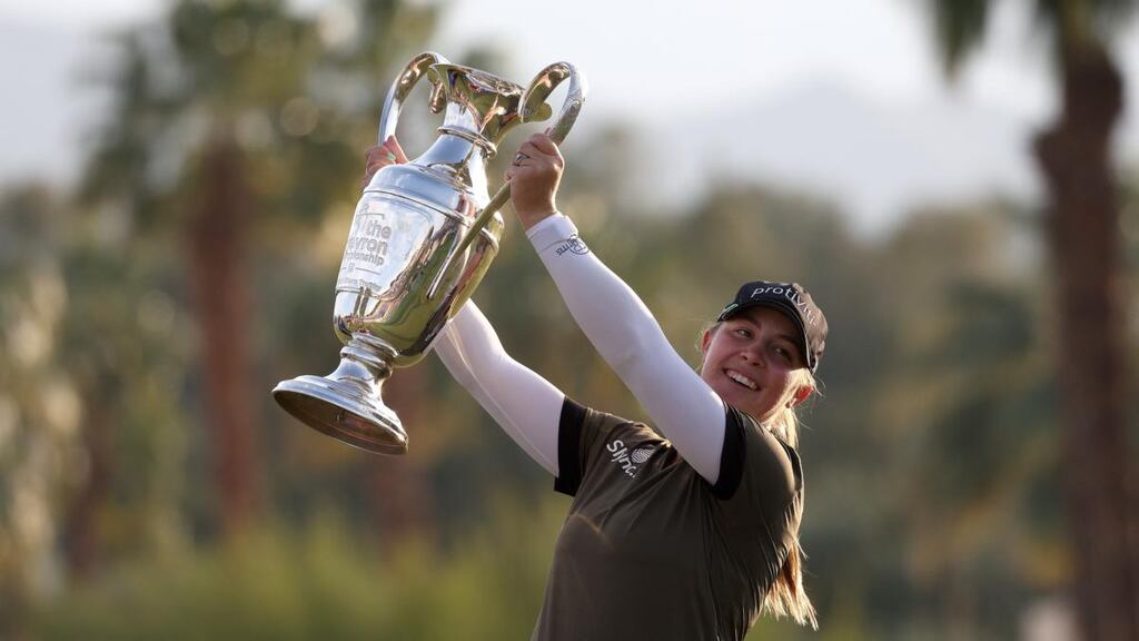 Jennifer Kupcho of the United States celebrates with The Dinah Shore Trophy after winning The Chevron Championship. Photograph: Harry How/Getty