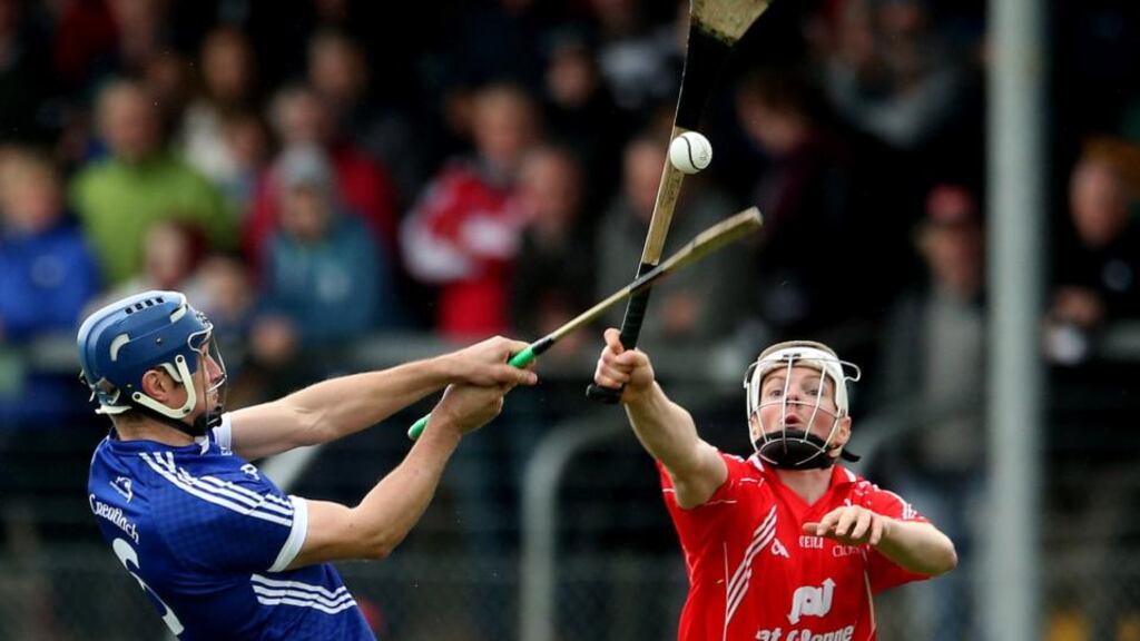Conor Ryan of Cratloe   battles with  Crusheen’s Alan Tuohy during the Clare Senior Hurling Club Final at Cusack Park in Ennis. Photograph: James Crombie/Inpho