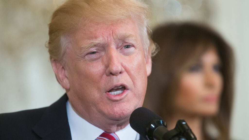 US President Donald  Trump: immigration move blocked. Photograph:   EPA/MICHAEL REYNOLDS