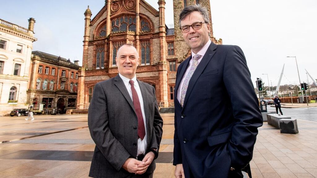 Invest Northern Ireland chief executive Alastair Hamilton and Terex Materials Processing president Kieran Hegarty.