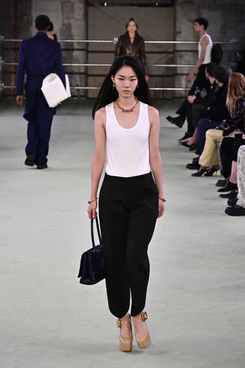 Models present creations during the Bottega Veneta catwalk show for the Fall/Winter 2022/2023 on the fifth day of the Milan Fashion Week. Photograph: Miguel Medina/AFP