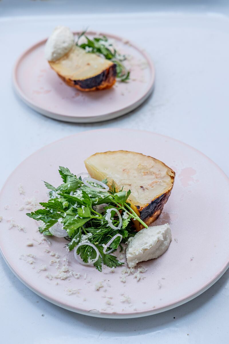 Salt-baked celeriac with horseradish crème fraîche and parsley and shallot salad. Photograph: Harry Weir