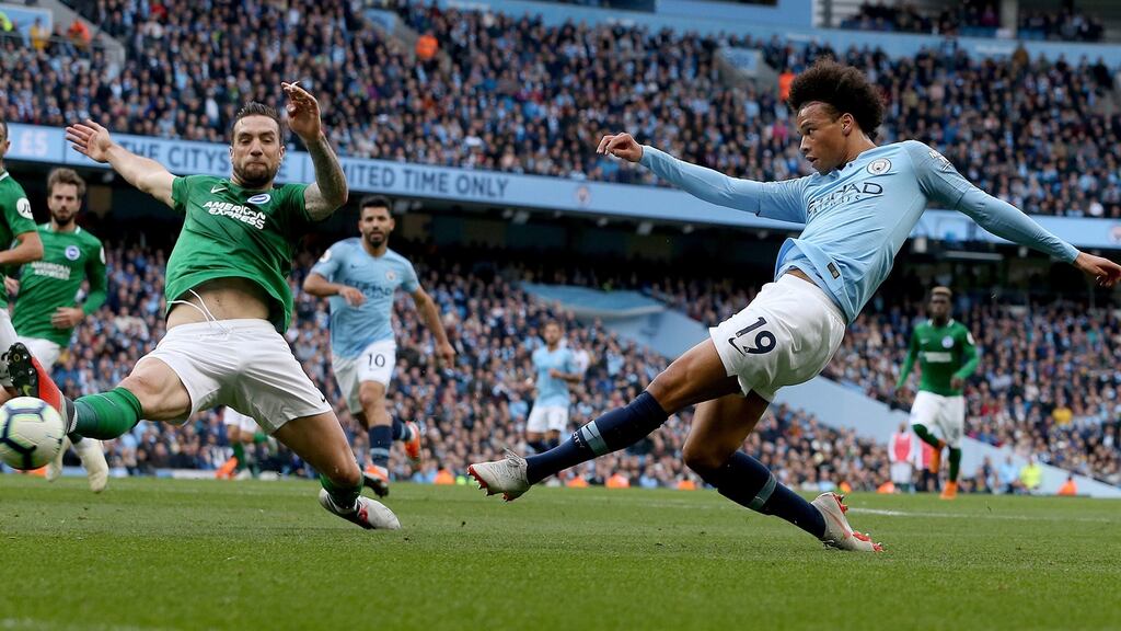 Manchester City’s Leroy Sane in action with Brighton’s Shane Duffy. Photograph: EPA.