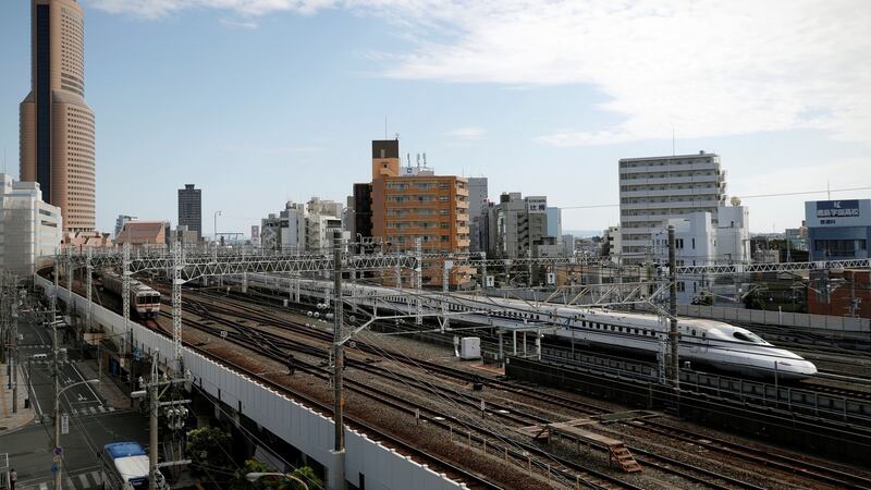 The Shinkansen, known in English as the bullet train, passes through Hamamatsu station. Adrian Dennis/AFP/Getty