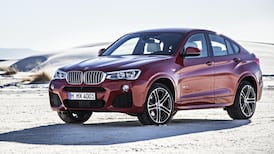 BMW’s Savile Row suit with muddy boots