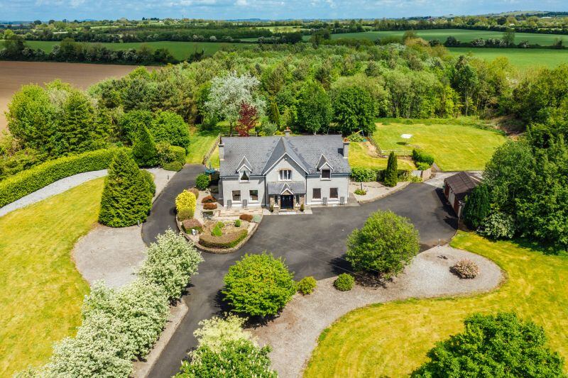 Aerial view of house and gardens