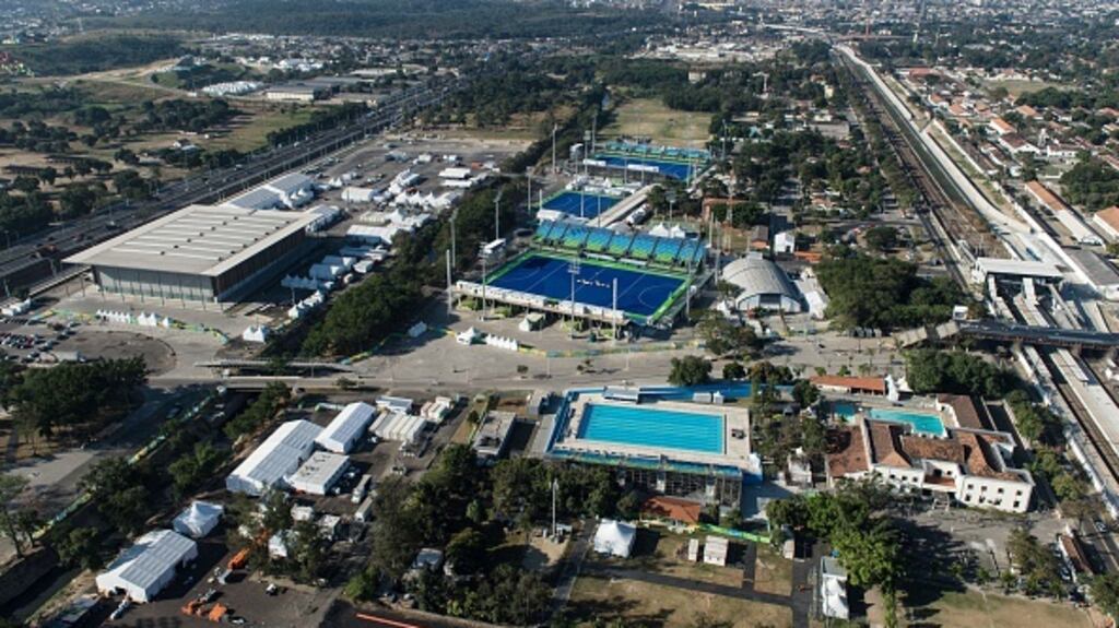 The Olympic Hockey Centre (blue fields) and the Youth Arena (L) that will host the modern pentathlon fencing matches. Photograph: Getty Images