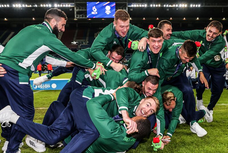 Ireland celebrate winning gold in the men's rugby Sevens final at the 2023 European Games and qualifying for the Paris Olympics. Photograph: Laszlo Geczo/INPHO