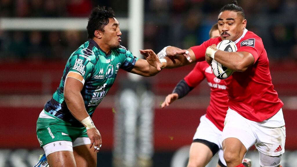 Francis Saili takes on Bundee Aki during Munster’s loss to Connacht: Saili may miss next two Champions Cup matches. Photograph: James Crombie/Inpho