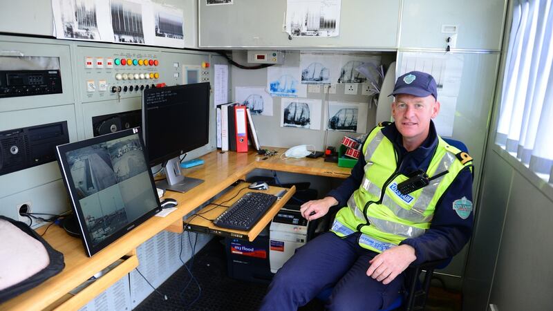 Customs officer Gerry McGrath operating the Customs X-ray scanner in Rosslare. Photograph: Bryan O Brien