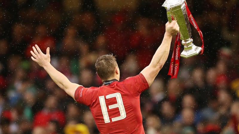 Jonathan Davies celebrates completing the Grand Slam.