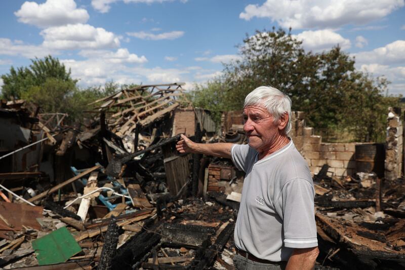 A 79-year-old man points to the remains of his house in Bakhmut, eastern Ukraine, on Wednesday, after it was destroyed by alleged Russian shelling. Photograph: Anatolii Stepanov/AFP via Getty Images