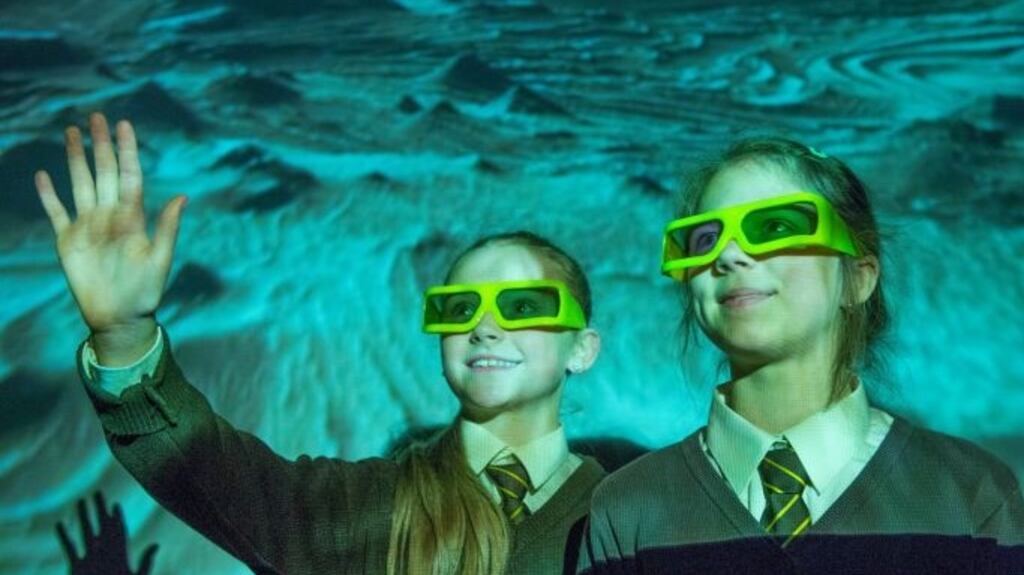 Students Leah O’Flaherty and Samantha Samsonova from St Patrick’s Girls Secondary School,  take a 3D tour of the universe at Cork City Hall as part of Science Week Ireland. Photograph: Gerard McCarthy