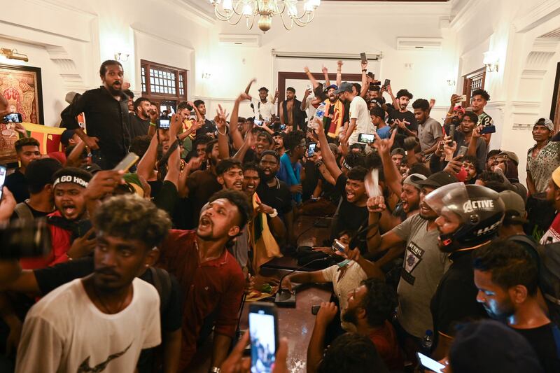 Demonstrators inside the office building of Sri Lanka's prime minister during an anti-government protest in Colombo. Photograph: Arun Sankar/AFP via Getty Images