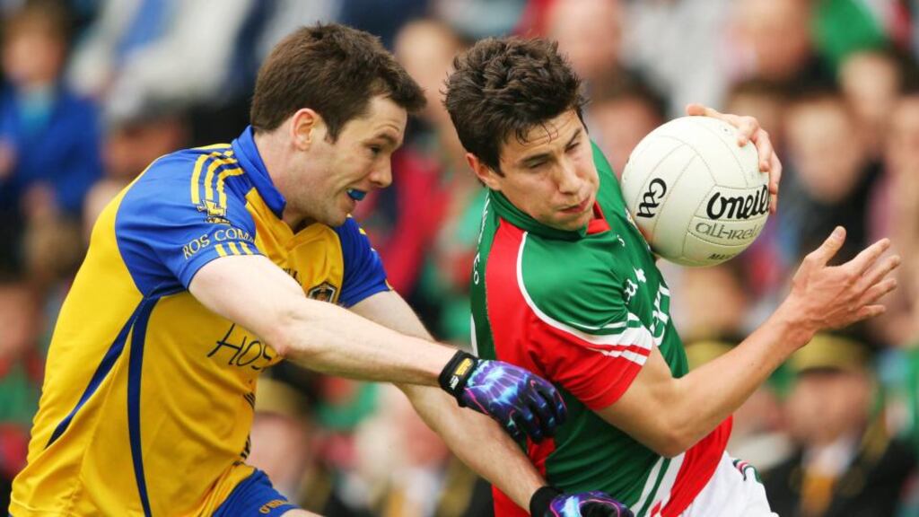 Mayo’s Alan Freeman (right) and Niall Carty of Roscommon at MacHale Park. Photograph: Cathal Noonan/Inpho