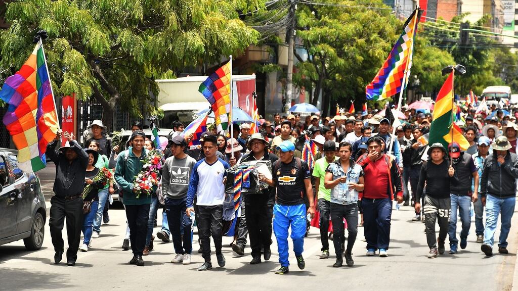 People march for the victims of clashes with police that left eight, in Cochabamba, Bolivia on Saturday. Photograph: Jorge Abrego/EPA