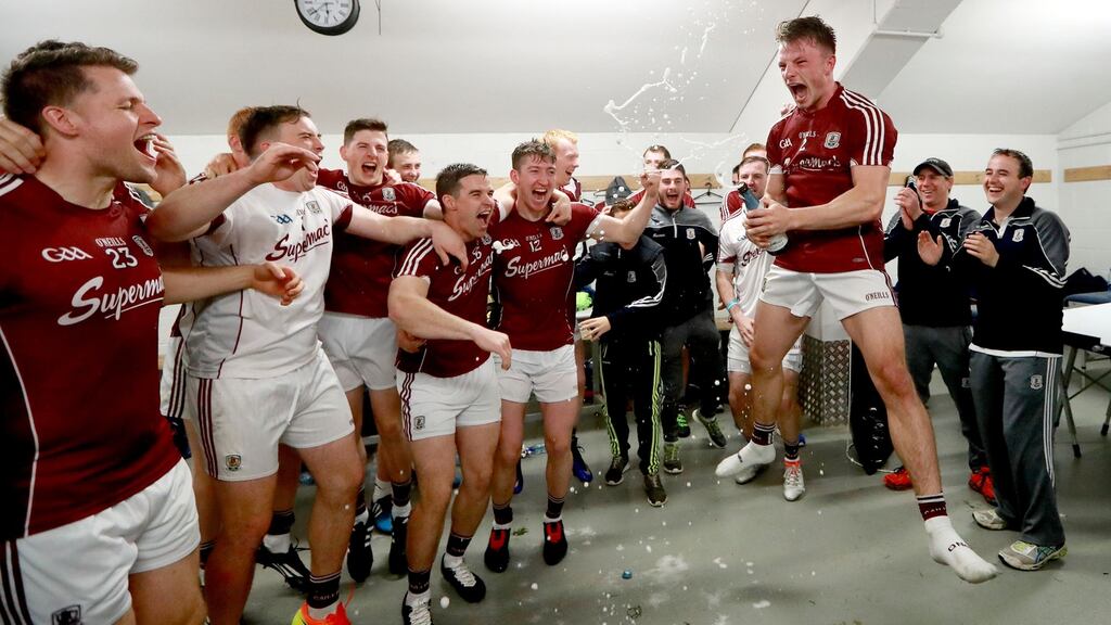 Champions!  Galway’s Eoghan Kerin celebrates with his team mates after the game. Photograph: James Crombie/Inpho