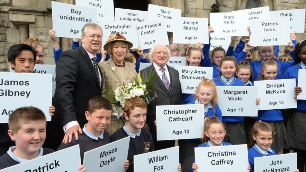President Michael D Higgins, with his wife, Sabina, and Joe Duffy, surrounded by pupils of St Patrick’s National School, Ringsend. Photograph: Cyril Byrne