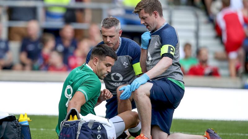 Conor Murray gets treatment at Twickenham. Photograph: Dan Sheridan/Inpho