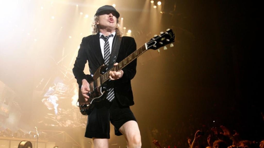 A file photograph of AC/DC lead guitarist Angus Young who has admitted the band’s future is uncertain after the departure of four of its core members in recent years. Photograph: Luke MacGregor/Reuters.