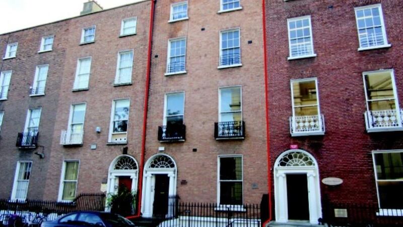 Four storey over-basement building on Herbert Street