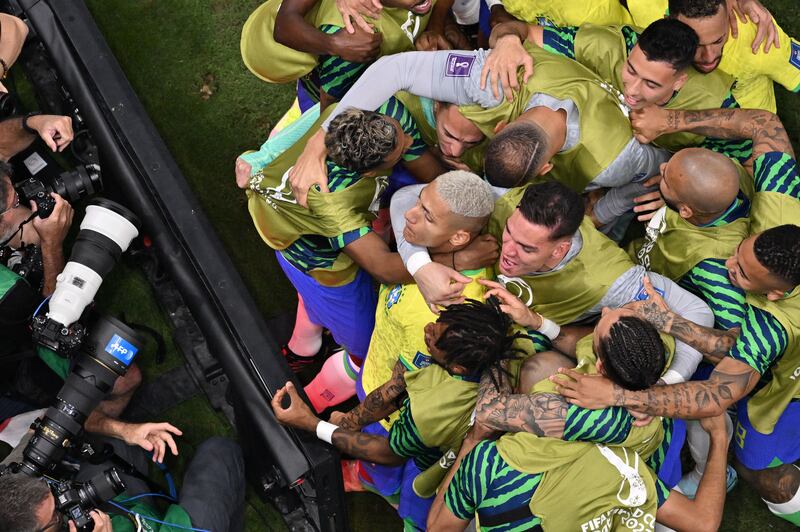 Richarlison is mobbed by his Brazilian team-mates after scoring against Serbia in the World Cup Group G match at the Lusail Stadium. Photograph: by François-Xavier Marit/AFP via Getty Images