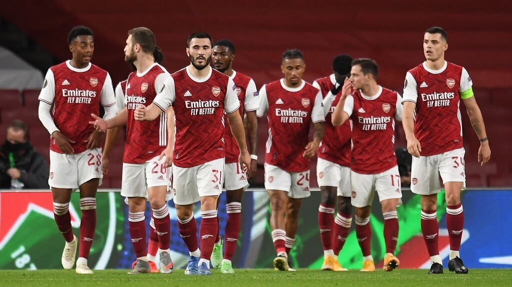 Arsenal players celebrate after the opening goal in their 3-0 Europa League win over Dundalk. Photo: Andy Rain/EPA