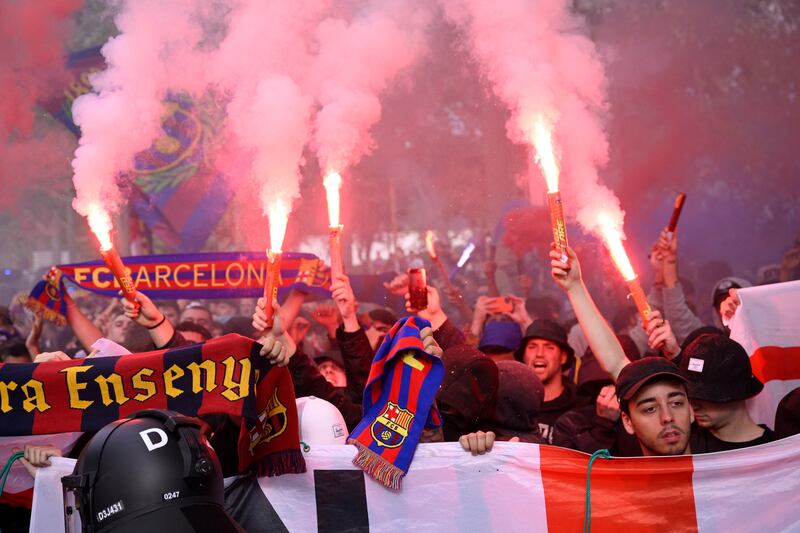 Barcelona supporters as they arrive to the stadium ahead of the UEFA Champions League quarter-final second-leg football match between Barcelona FC and Paris SG. Photograph: Josep Lago/AFP via Getty Images