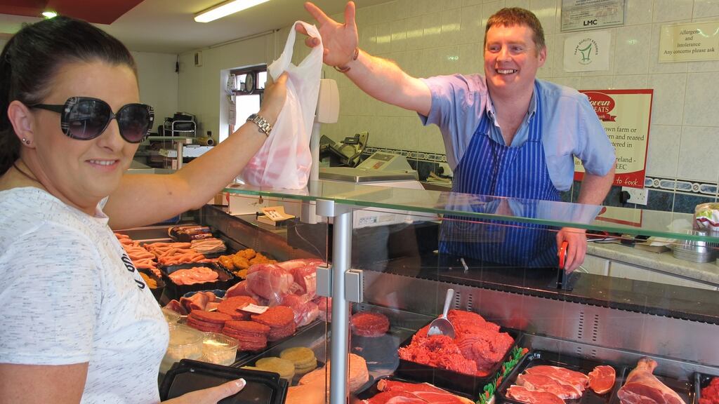 Belleek butcher John Dolan with Nuala Burns: Mr Dolan said “it should be left the way it is. The Border doesn’t really exist at the minute anyway.”