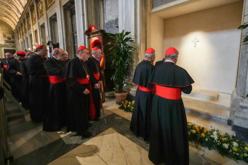Cardinals visit the tomb of late Pope Francis. Photograph: Andrew Medichini/AFP/Getty Images