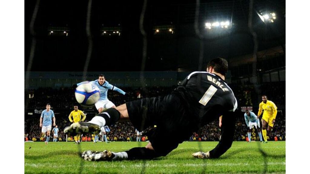 Carlos Tevez, who scored Manchester City's opening goal, misses a penalty during the FA Cup Third round replay against Leicester City at Eastlands. Photograph: Laurence Griffith/Getty Images