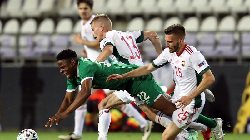 Ireland’s Chiedozie Ogbene is challenged by  András Schäfer and János Hahn of Hungary during the friendly match at the  Szusza Ferenc Stadium in Budapest. Photograph: Ferenc Izsa/Inpho