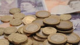 Sterling inches lower on Brexit worries