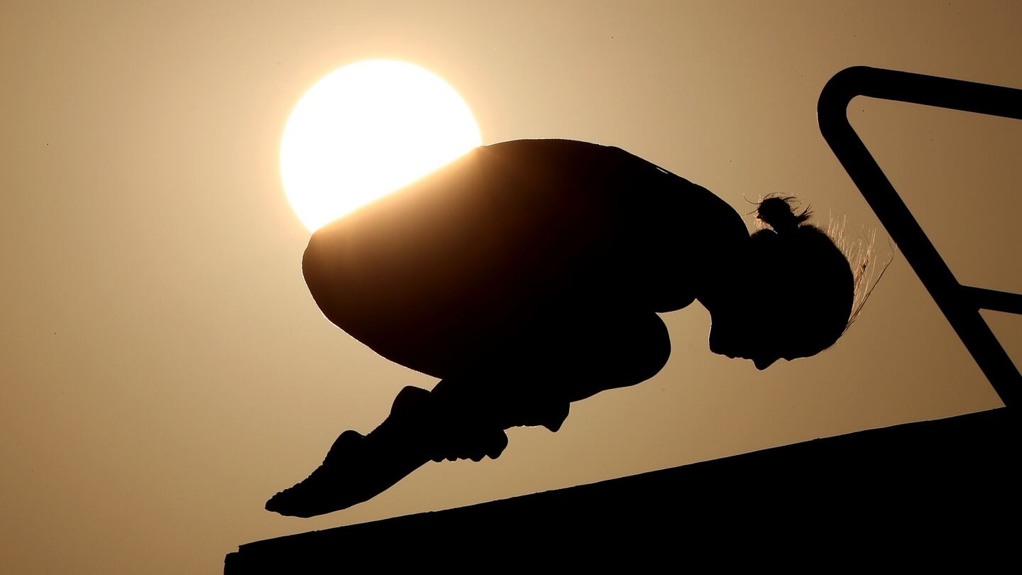 A diver during a training session as the sun sets ahead of the Rio Olympic Games, Brazil. Photograph: Mike Egerton / PA