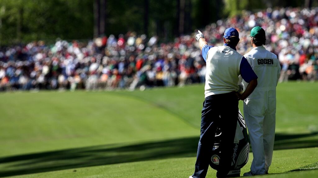 Colin Byrne alongside Retief Goosen at the 2007 Masters at Augusta National. Photograph: Harry How/Getty Images