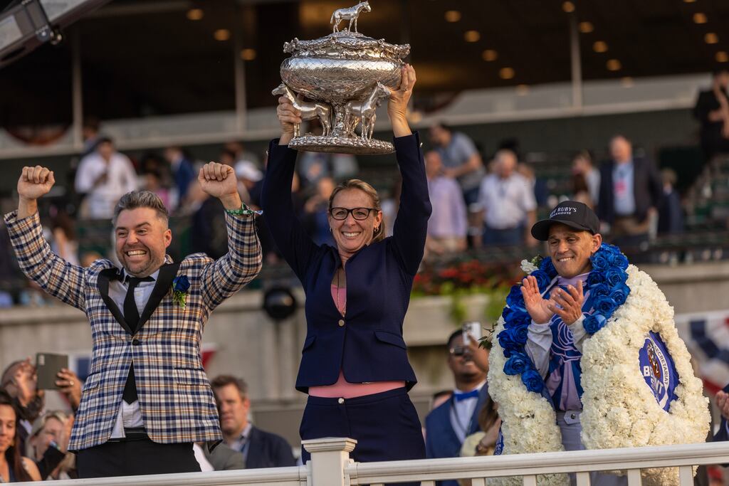 Trainer Jena Antonucci celebrates with owner Jon Ebbert and jockey Javier Castellano after her horse Arcangelo won the 155th running of the Belmont Stakes on Saturday. Photograph: Victor Blue/New York Times