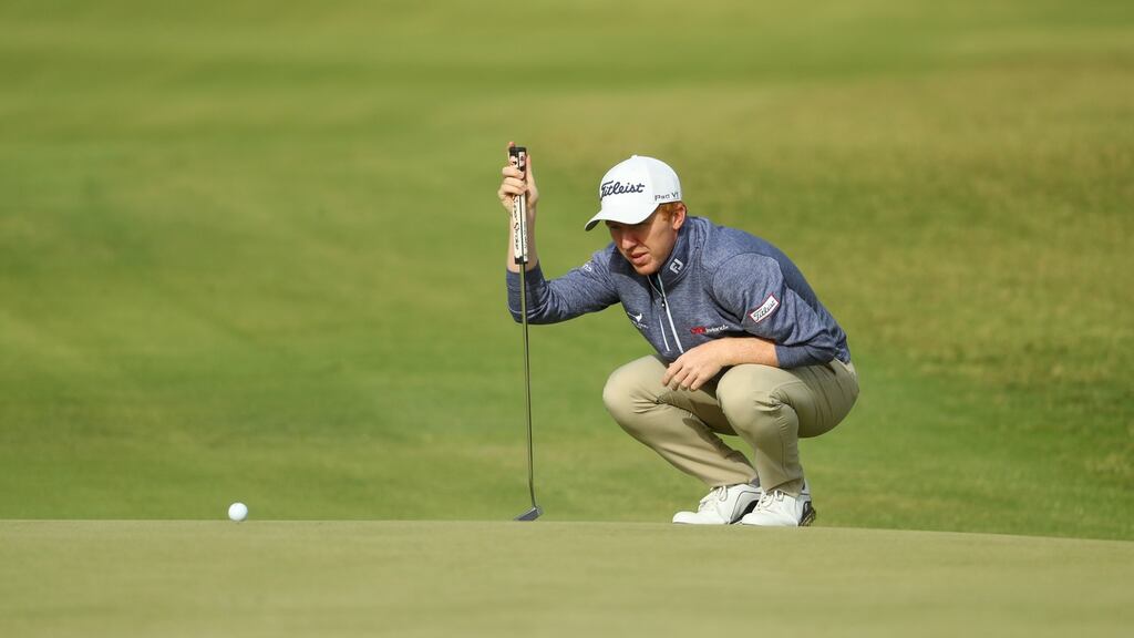 Ireland’s Gavin Moynihan lines up a putt on the sixth green during day one of the Commercial Bank Qatar Masters at Doha GC. Photograph: Warren Little/Getty Images
