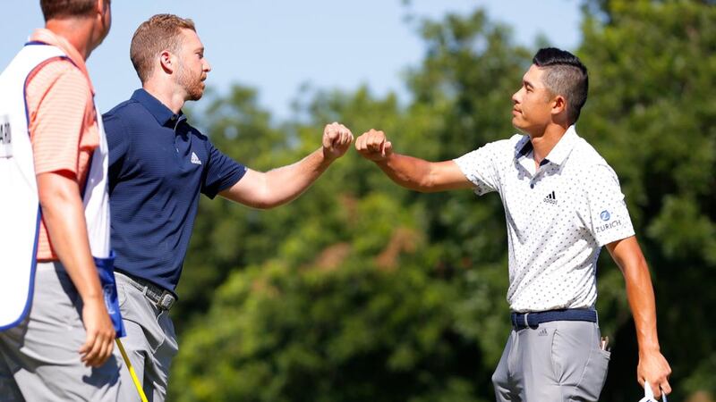 Daniel Berger (L) and Collin Morikawa bump fists after their play-off in Texas. Photograph: Tom Pennington/Getty