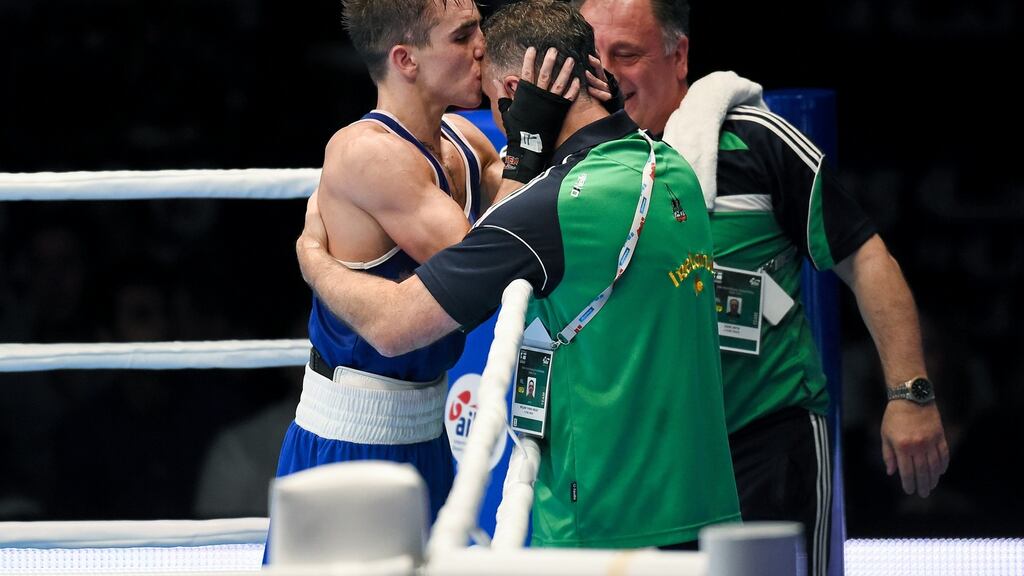 Michael Conlan kisses coach Billy Walsh after winning his semi-final in the men’s bantamweight World Boxing Championships. Photograph: Paul Mohan/Sportsfile