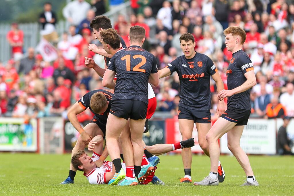 Armagh's Rian O'Neill and Derry's Brendan Rogers in All-Ireland Senior Football Championship Round 2. Photograph: Lorcan Doherty/Inpho