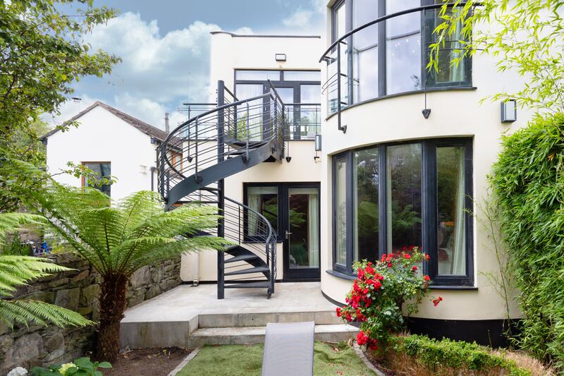 Rear of house with spiral staircase