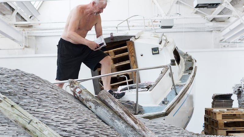 David Mach working on his newspaper installation. Photograph: Andrew Downes, xposure