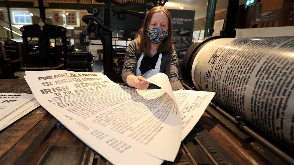 Mary Plunkett, education officer, at a Wharfedale printing press in the National Print Museum in Beggars Bush, Dublin: Museum staff are preparing to reopen its doors on Monday. Photograph: Donall Farmer