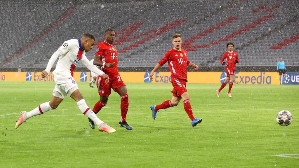 Kylian Mbappe  scores the opening goal for  Paris Saint-Germain against Bayern Munich during the Champions League quarter-final, first leg at Allianz Arena. Photograph: Alexander Hassenstein/Getty Images