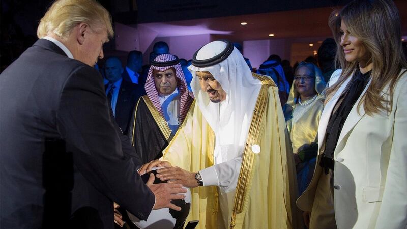 US President Donald Trump, US First Lady Melania Trump and King Salman bin Abdulaziz al-Saud of Saudi Arabia opening the World Center for Countering Extremist Thought in Riyadh, Saudi Arabia. Photograph: EPA/Saudi Press Agency