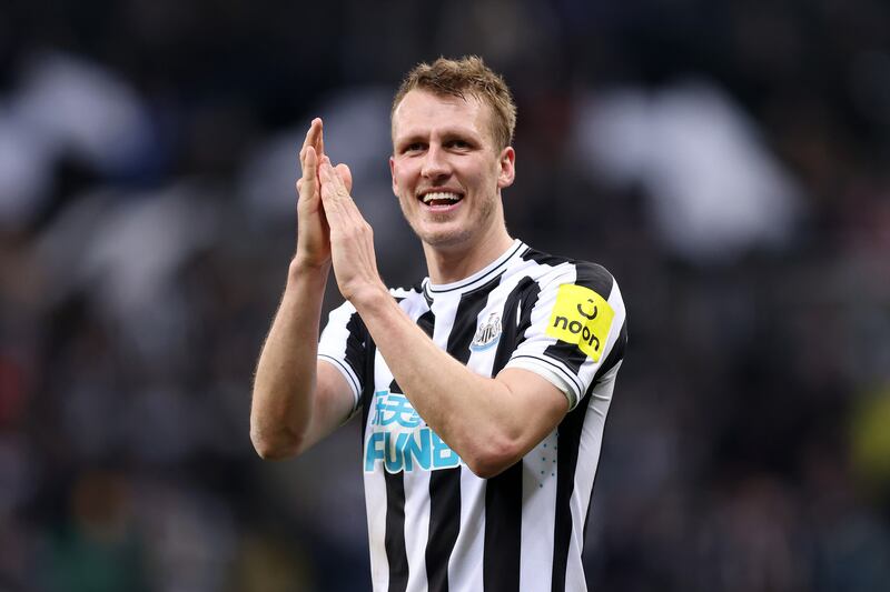 Dan Burn of Newcastle United applauds the fans following their victory. Photograph: George Wood/Getty