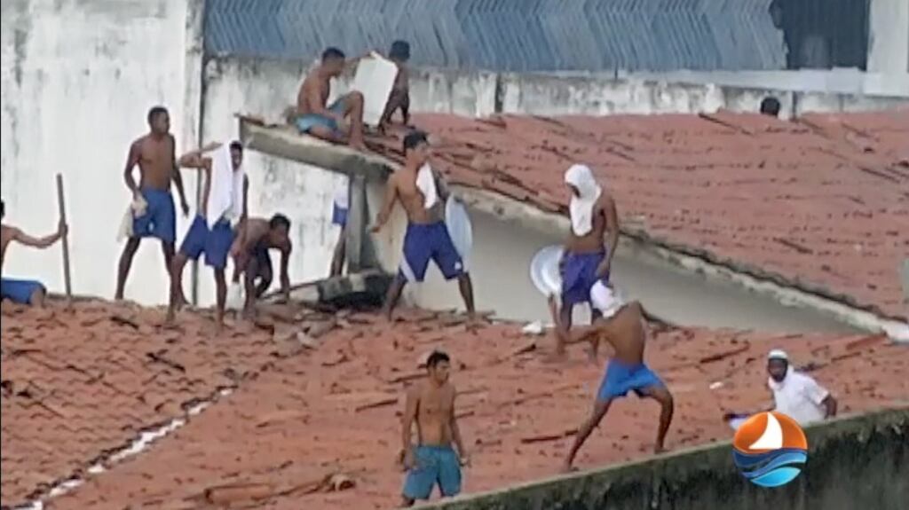 Inmates on the roof of Alcacuz prison in  northeastern Brazil on Saturday. Photograph: HO/AFP/Getty